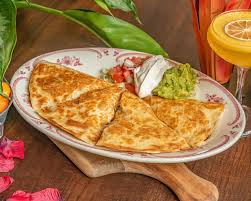 El Camino West Palm Beach signature dishes Chicken QuesadillaAchiote Chicken BurritoGuacamole